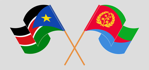 Crossed and waving flags of South Sudan and Eritrea