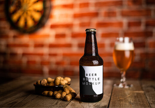 Fresh Lifestyle Beer Bottle on Wooden Table in a Bar Restaurant Pub with a Glass of Beer in Dim Atmosphere Background