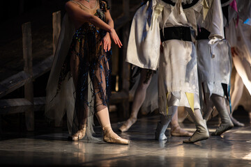 Fototapeta na wymiar La Esmeralda ballet. Closeup of dancing legs.