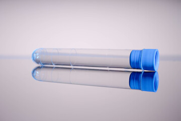 Testing for the presence of coronavirus. Test tube positive for COVID-19. Empty test tube. Test for coronavirus. Vaccination