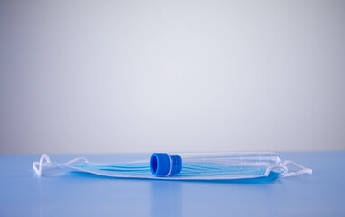 Testing for the presence of coronavirus. Test tube positive for COVID-19. Empty test tube. Test for coronavirus. Vaccination