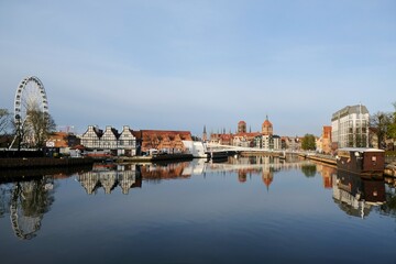 Panorama of Old Town in Gdansk and Motlawa river with ships.