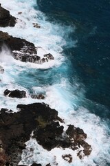 waves crashing on rocks
