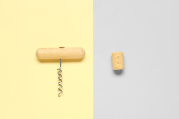 Wine cork and opener on color background