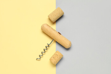 Wine corks and opener on color background