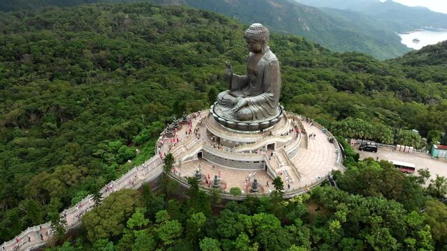Aerial view of historical landmark Tian Tan Buddha statue in Lantau Island, Hong Kong, China.