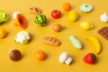 pattern of vegetables on a yellow background.