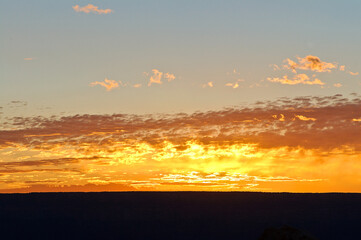 Fototapeta premium front view, very far distance of a silhouetted, dawn at South Rim- Grand Canyon- Arizona-