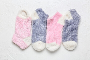 Warm socks on light background