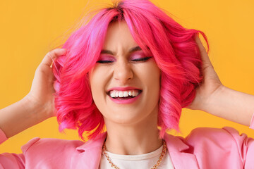 Happy woman with bright hair on color background