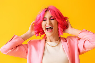 Happy woman with bright hair on color background
