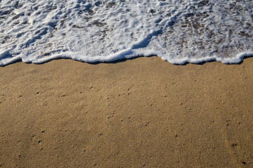 Detail of the sea wave in a stormy day with shades of drama.