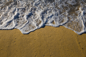 Detail of the sea wave in a stormy day with shades of drama.