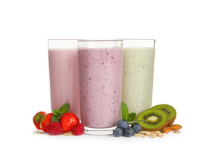 Glasses of different oatmeal smoothies and fresh ingredients on white background