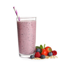 Glass of tasty smoothie with berries, mint and oatmeal on white background