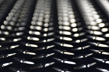 Checker plate from low angle. Diamond plate texture.