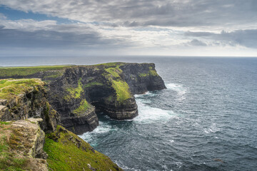 Hags Head, far end of iconic Cliffs of Moher, popular tourist attraction, UNESCO world heritage, Wild Atlantic Way, Clare, Ireland