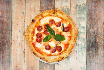 The pepperoni is characteristically mild, slightly smoked, and bright red