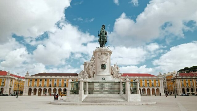 A man riding a horse Portuguese statue in the City center of Lisbon, Portugal. Arco da Rua Augusta - Historical Place in the City center, main most famous square in Lisbon on a sunny day.