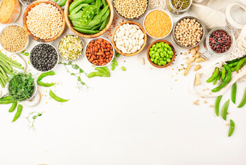 Legumes, beans and sprouts. Dried, raw and fresh, top view. Red kidney beans, lentils, mung beans, chickpeas, soybeans, edamame, green peas, Healthy, nutritious, diet food, vegan protein - obrazy, fototapety, plakaty