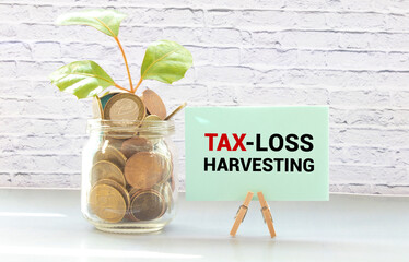 Text TAX LOSS HARVESTING written on white paper note on calculator.Business concept.