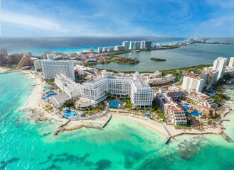 View of beautiful Hotels in the hotel zone of Cancun. Riviera Maya region in Quintana roo on Yucatan Peninsula. Aerial panoramic view of allinclusive resort - obrazy, fototapety, plakaty