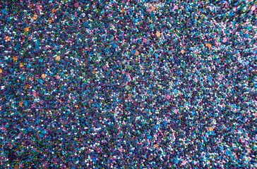 Many multicolored shiny stars as a background, texture. High quality photo