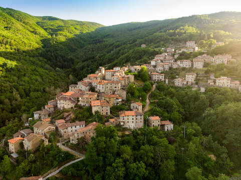 Aerial view of beautiful Raggiolo village, located on the eastern slopes of Pratomagno, surrounded by chestnut forests.