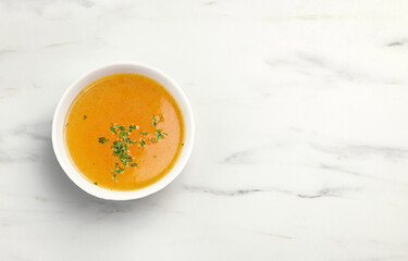 bowl of fresh chicken bouillon