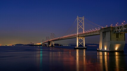 Fototapeta na wymiar 日没後の瀬戸大橋のライトアップ情景＠香川