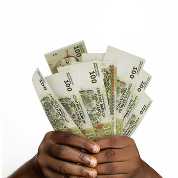 Black hands holding 3D rendered 100 Swazi lilangeni notes. closeup of Hands holding Swaziland currency notes