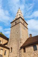Village of Baume-les-Messieurs in the Jura in France. Abbaye Saint-Pierre de Baume, the facade of the 15th century church