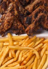 grilled wings with fries
