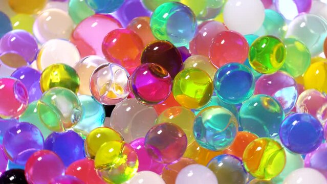 Colorful hydrogel balls rotation background