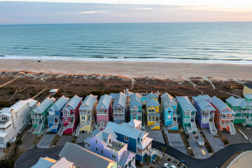 Aerial View of multicolored homes on the beach facing the ocean in Atlantic Beach North Carolina