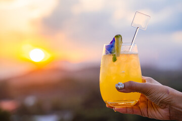 Sipping cocktails at sunset time