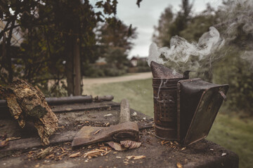 Rustic old smoker or firebox at the apiary