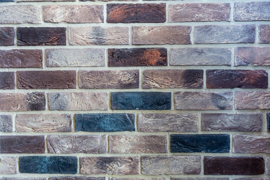 Brick wall of red color. 1000 of bricks of Brown and Grey color. Modern brick wall for background. Old red brick walled. Part of a red brick wall. Perfect wall for for web and print or photos.