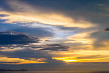 Fishing boat in the sea at golden time.