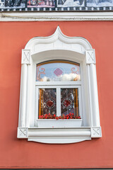 window with carved platbands