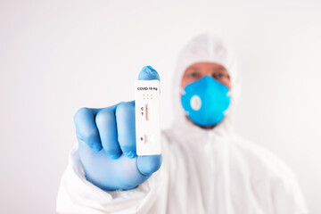 Fototapeta premium Doctor with laboratory COVID-19 test kit for diagnosis coronavirus infection.