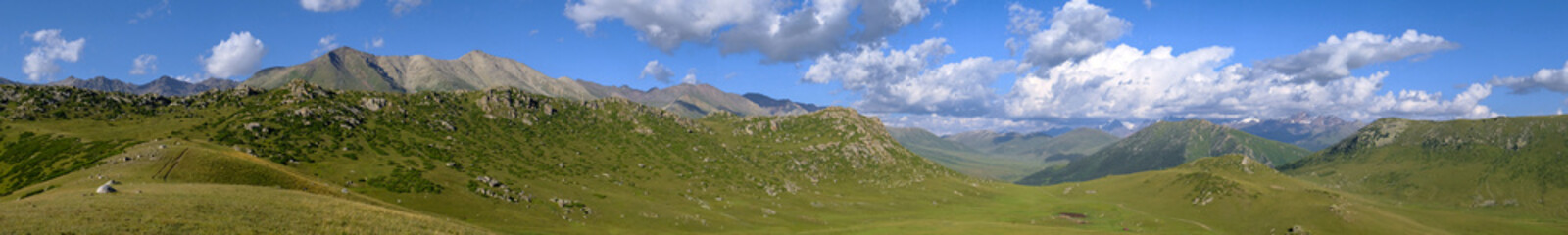 Beautiful mountain valley landscape with cloudy sky on background. Nature landscape.