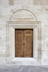 Old brown wooden entrance door of house in Turkey Istanbul