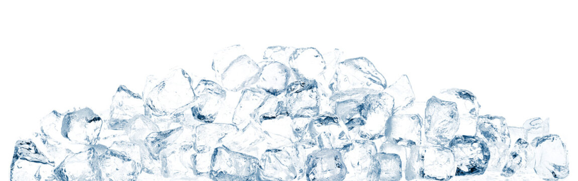 Heap of blue toned ice cubes on white wide background. Ice tray.