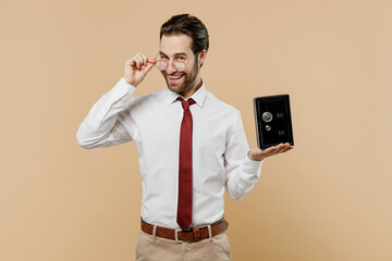 Young successful employee business man corporate lawyer 20s wear classic white shirt red tie take off glasses work in office protecting savings money in safe isolated on plain beige background studio.
