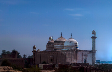 Fototapeta na wymiar Abbasi Mosque is a mosque located close to Derawar Fort in Yazman Tehsil, within the Cholistan Desert in Bahawalpur District, Punjab province of Pakistan