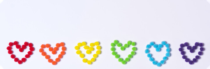 Banner. Hearts of rainbow color from fluffy circles. Background for holiday valentine's day. LGBT concept. Movement for equal rights
