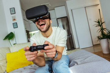 Man wearing virtual reality goggles in the living room and play video game.