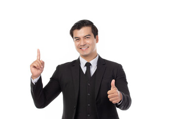 Portrait of a confident business man in black suit smile and pointing to copy space isolated on white background. Portrait business concept.