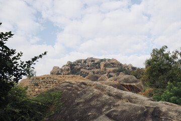 A selective focus of brown boulders at Chitradurga Fort, Karnataka, India. The fort is also called Elusuttina Kote (meaning the fort of seven circles).